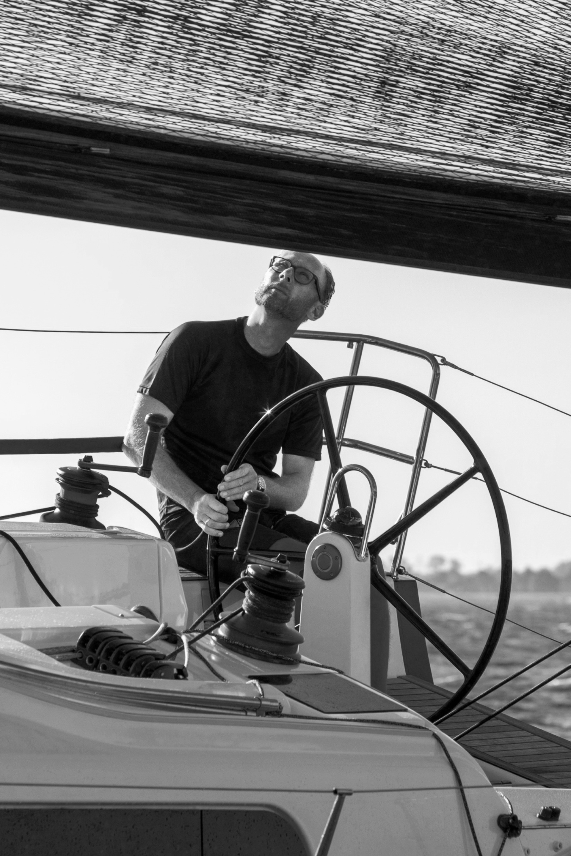 Marc Lichte navigating a yacht.