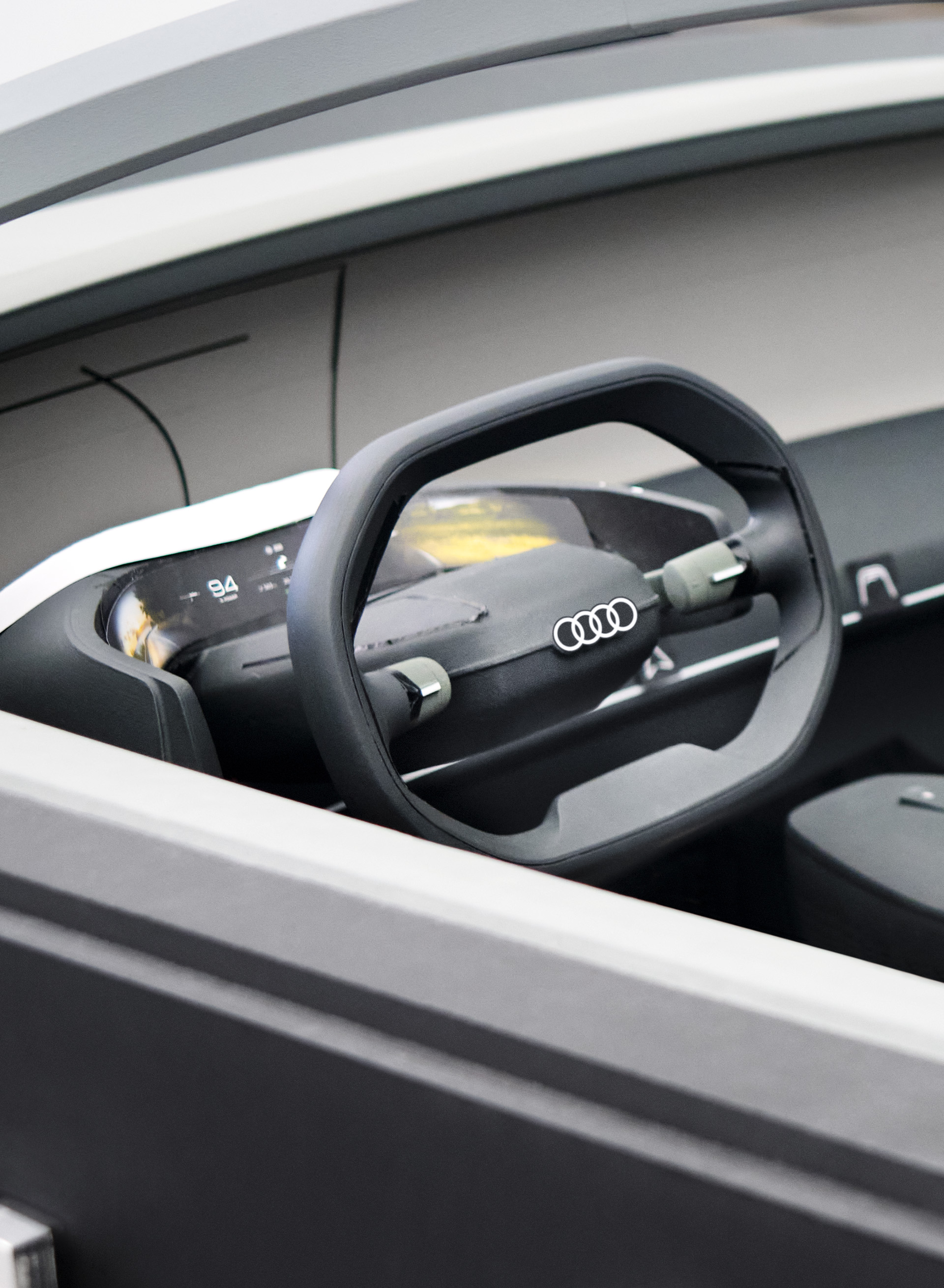 A concept sketch of the steering wheel in the Audi grandsphere concept{ft_concept-car-functions}.