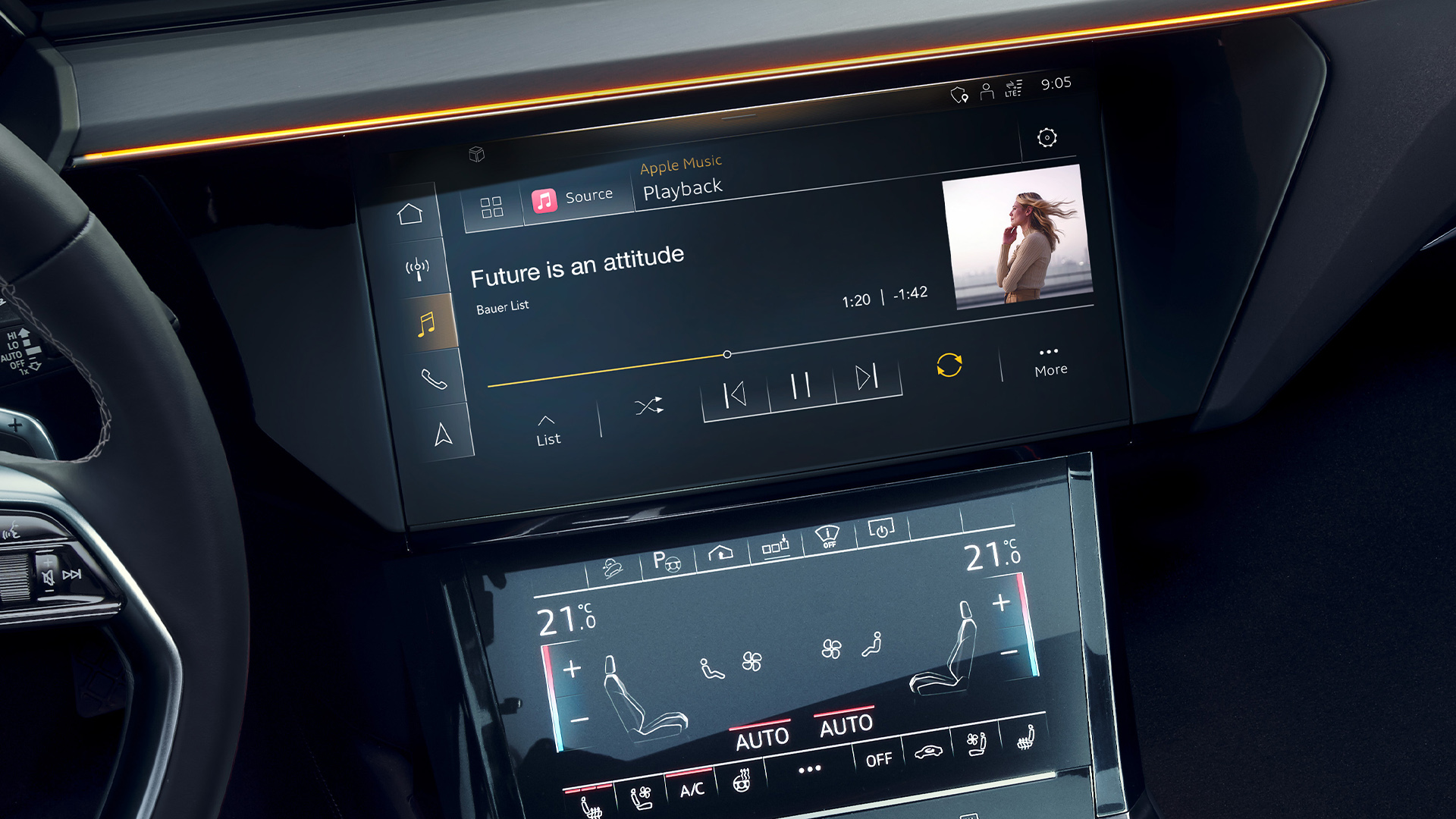 Close up of the display in the vehicle playing music.