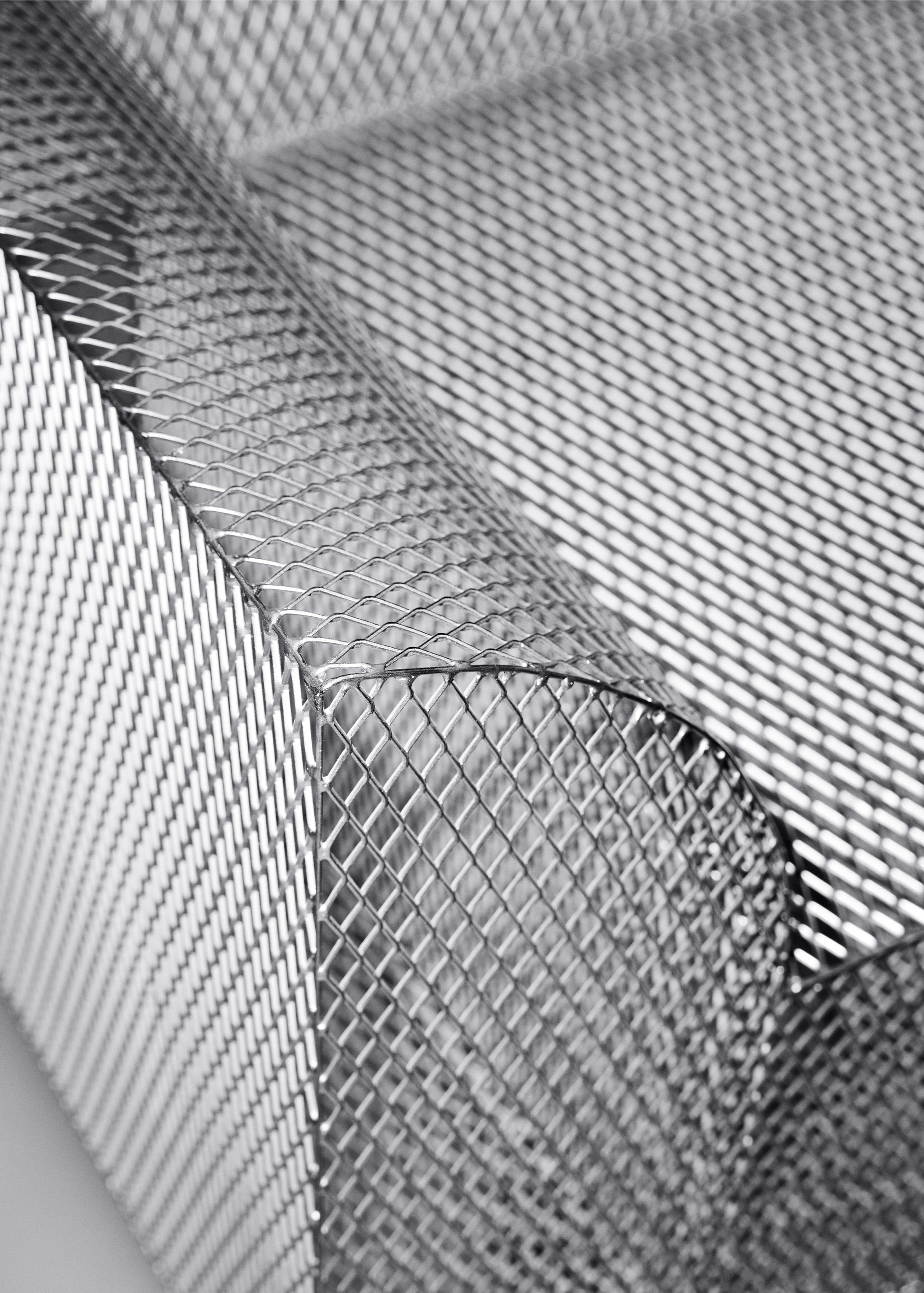Detail shot of a metal armchair.